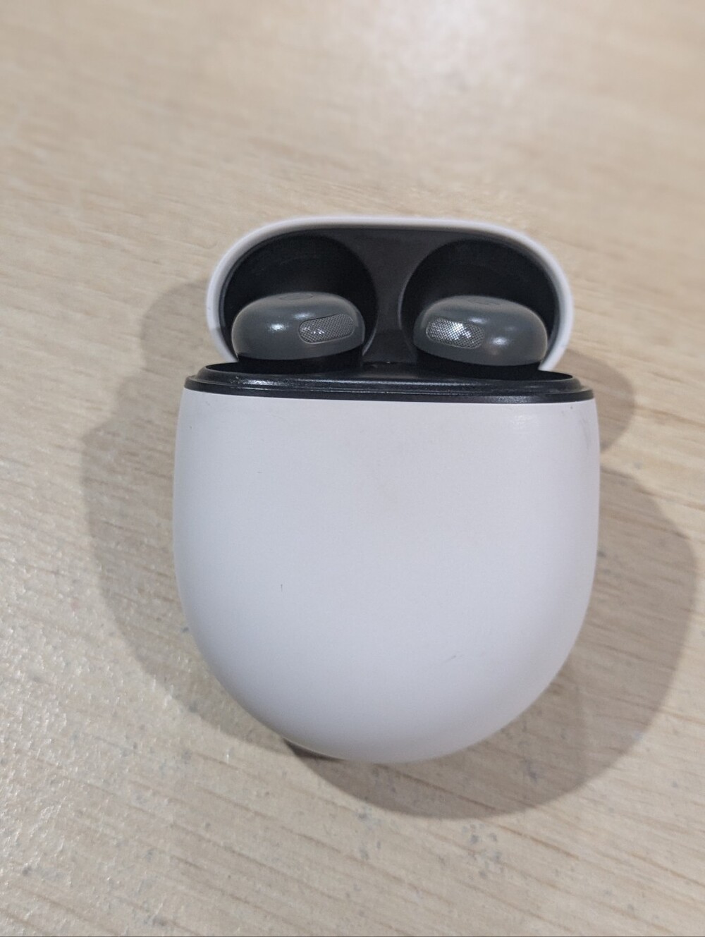 google True Wireless Earbuds with White Charging Case and Gray Earbuds